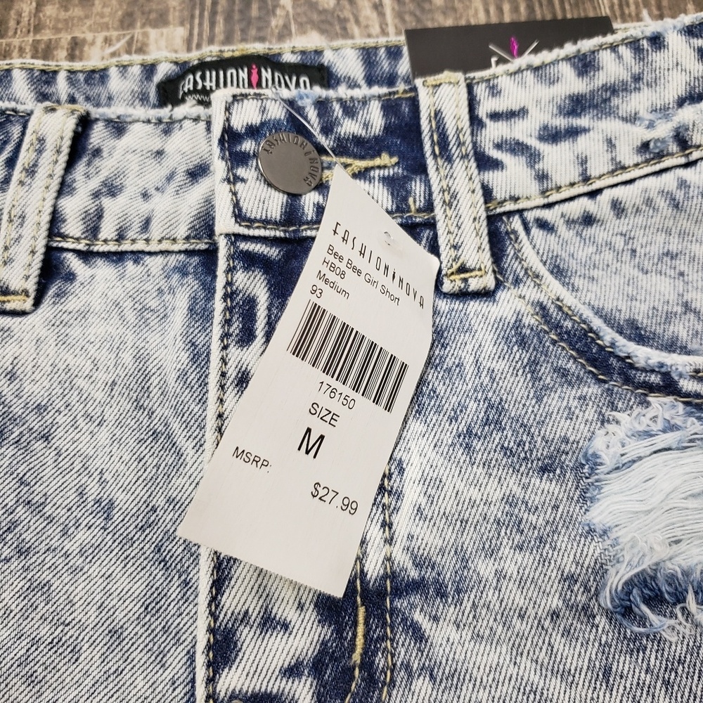 Distressed Light Blue Denim Shorts - Women - Picture 3 of 8